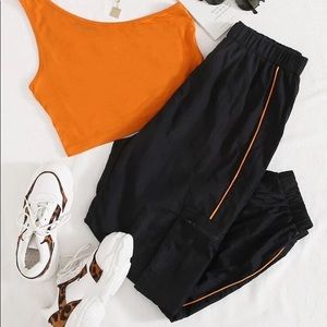 Black and orange sweatpants